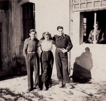 Peter Wolff (left) with two friends during his training in the Hachshara camp at Schniebinchen, 1940'© Susanne Wolff
