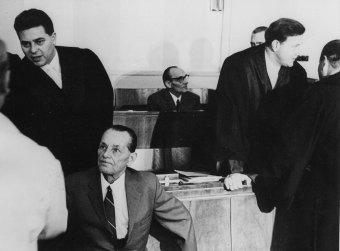 Josef Windeck (seated), accused and convicted of murder, seen in the courtroom during the 
'3rd Frankfurt Auschwitz Trial, 1966/67
'© Fritz Bauer Institute