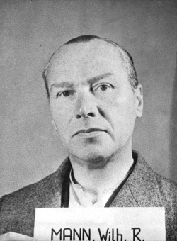 Wilhelm Rudolf Mann. Fotoaufnahme aus der National Archives Collection of World War II War Crimes Records vom Nürnberger Prozess gegen I.G. Farben'© National Archives, Washington, DC